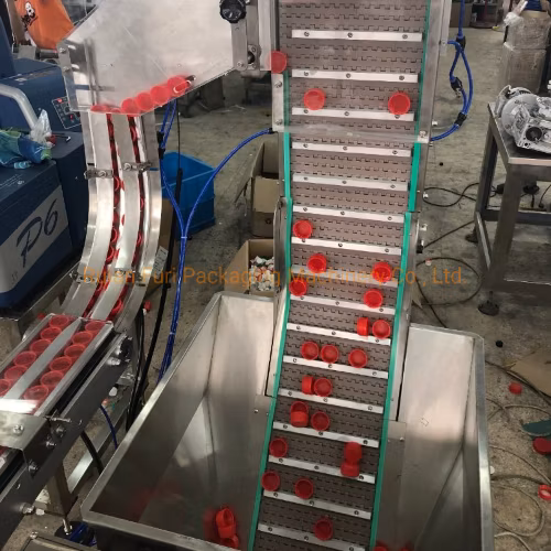 Machine automatique d'assemblage de bouchons de bouteilles